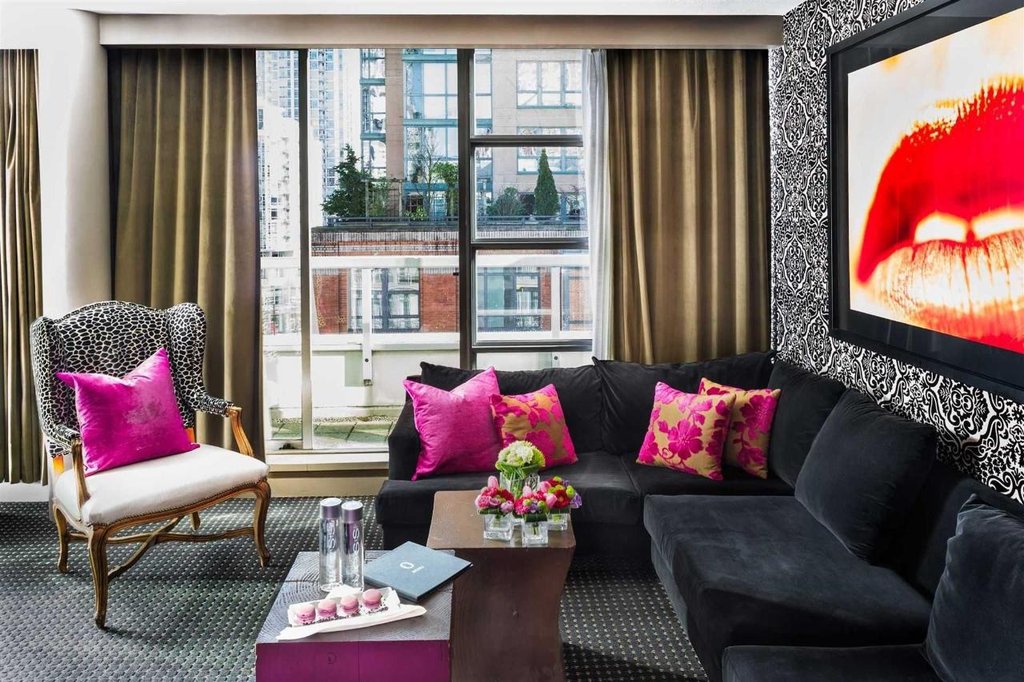 black and pink living area of signature hotel suite at Opus Yaletown